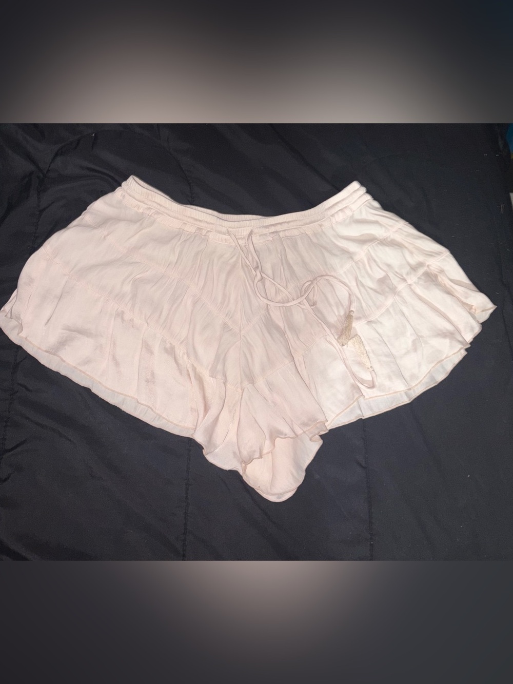 Pink ruffle shorts with drawstring waist